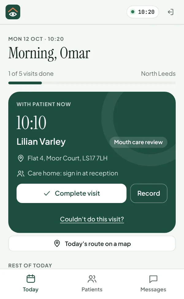 The dentist's day on a phone: the patient they're with now and the visit, with buttons to complete it.
